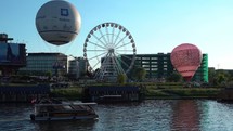 Ferris Wheel, Boats, and hot air Balloons