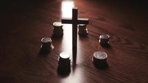 cross surrounded by money 
