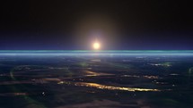 Planet Earth horizon view from space with the sun rising. Seamless loop	