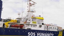 Migrant rescue ship sos Humanity stops in the port