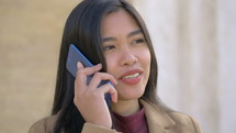 young woman talking on a cellphone 