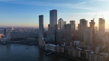 Bright Golden Sun Shining Through Buildings in London at Sunrise