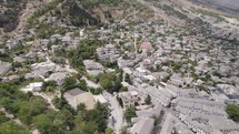 Gjirokaster Picturesque cityscape, Grey roofs Landscape, Albania. Drone Flyover