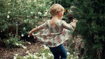a toddler girl dancing 