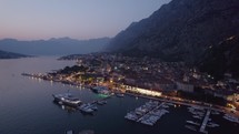 Beautiful city under the mountain and sea port of Kotor, Montenegro, aerial view