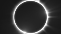 Total Solar Eclipse Ring of fire Halo in space. Black and white, Seamless Loop	