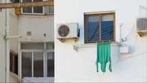 Sweater drying on clothespins against a white wall of a house in Spain