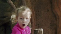 Child is astonished and a bit afraid with something