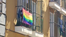 LGBTG+ Rainbow LGBT Pride Flag on Building Window