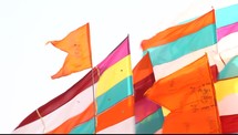 colorful flags blowing in wind 