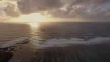 Picturesque seascape at golden sunset, aerial view