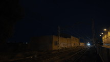 Train passing by at night
