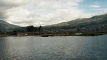 Sailing Through Calm Waters Of San Pablo Lagoon Near Otavalo, Ecuador.