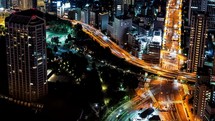 Time-lapse of highways through Minato, Tokyo, Japan at night. 