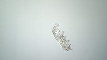falling crown on white background.