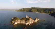 drone flying over an island 