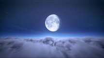 Timelapse of full moon on starry sky above moving clouds. The moon on cloudy sky. Christmas night background. Beautiful cloudscape 