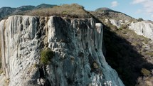 Hierve el agua natural travertine rock formations in San Lorenzo Albarradas, Oaxaca during a sunny day	.