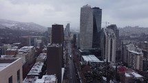 Snowy city center and skyscrapers