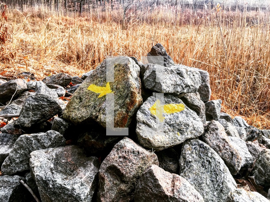 arrows painted on rocks 
