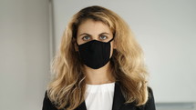 businesswoman wearing a face mask 