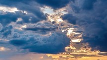 Sunset Cloudy Sky With Fluffy Clouds. Sunset Sky Natural Background.