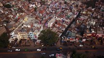 Aerial drone cinematic Busy India street at Arga near iconic Taj Mahal 
