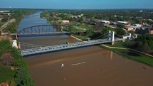Tracking Shot of Suspension Bridge and Brazos River Near Downtown Waco, Texas