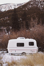 vintage camper in the mountains 