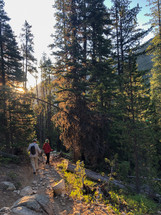 couple hiking on a mountain trail 