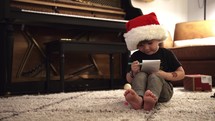 child making a list for Santa Claus 