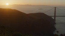 Pan across San Francisco Bay hills as sun rises
