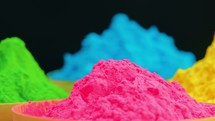 Colored Powder Into Plastic Cups For Holi Festival