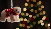 Bear Christmas decoration on tree copy space background
