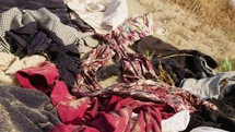 Textile Dump with used Clothes waste into the desert, fast fashion