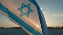 Israel Flag waving on sky background