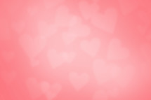Light pink love concept soft background with blurred hearts