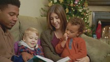 a family reading Christmas books 