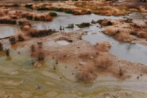 puddles on a muddy landscape 