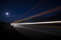 streaks from head lights from traffic at night 