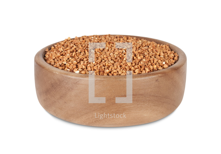 Buckwheat in a wooden bowl.