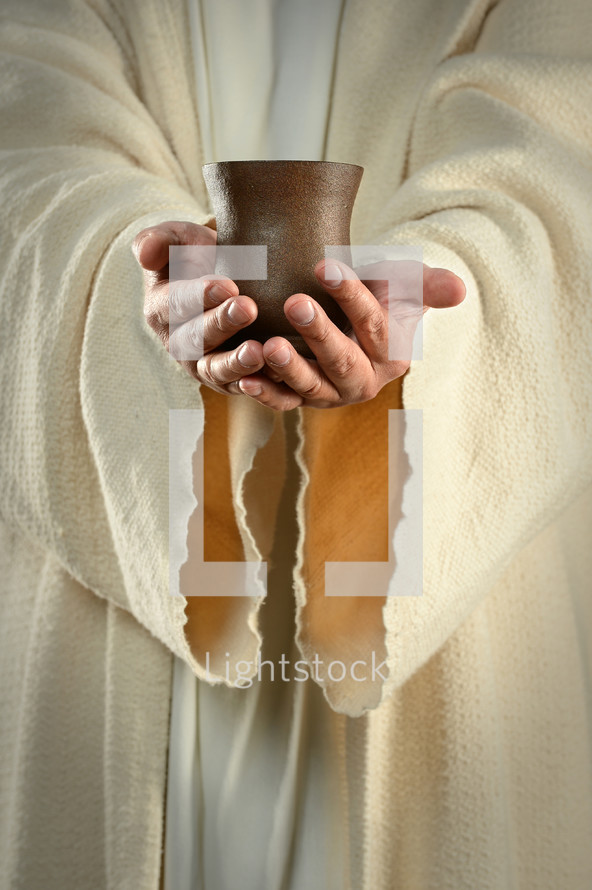 Jesus holding a cup 