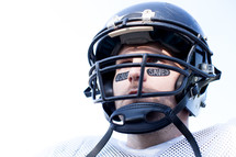 face of a football player in a helmet 
