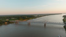 Drone Video of Mississippi River in Natchez, Mississippi at Sunset Looking South. High quality 4k footage