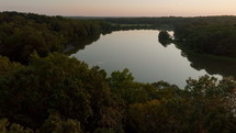 Aerial View Over Lake at Sunset in Mississippi. Small lake in Carroll County in Mississippi during beautiful sunset. 