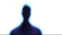 out of focus silhouette of a man 
