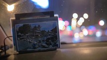 postcard in a taxi in bangkok at night