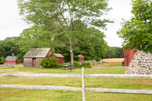 Historic shed and trees on quiet summer day
