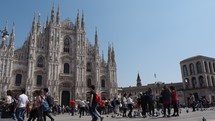 MILAN, ITALY—Tourists in Piazza Duomo (meaning Cathedral Square).