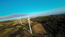 wind power plant technology on the mountains, aerial view fpv